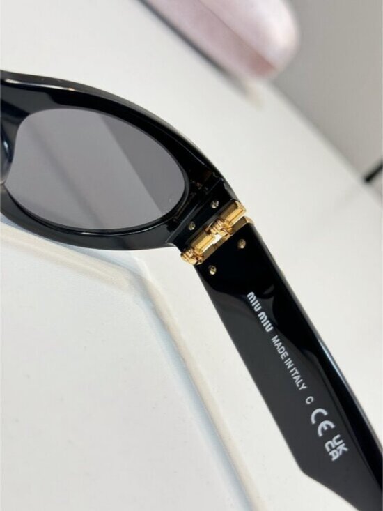 Miu Miu Black Frame Black Lens Oval Sunglasses main image 5